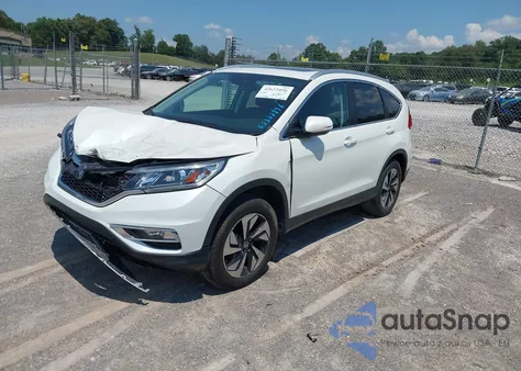 2016 Honda Cr-V Touring z USA, uszkodzony, nr VIN 5J6RM4H95GL118070